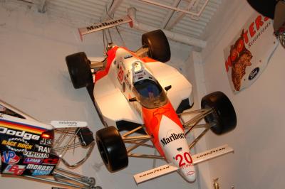 A full size race car hanging inside the restaurant (minus the transmission, which would make the car too heavy)