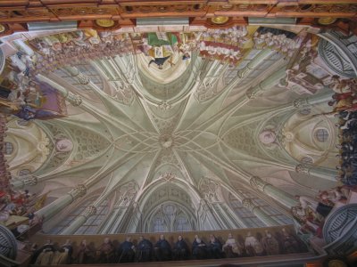 The magnificent 18th-century trompe d'oeil ceiling of the Baroque library in Eger's Lyceum.