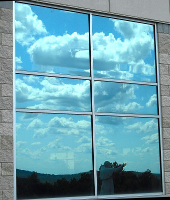 Reflection On The Windows Of The Visitors Center