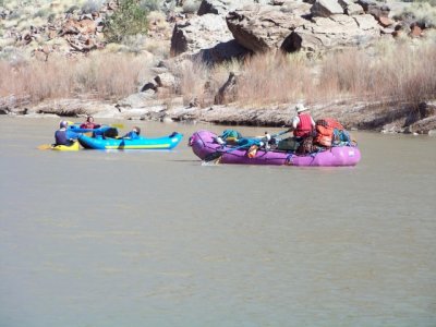 ...a group of raftersfloating down river