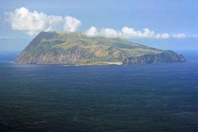 Corvo, the smallest, most western island in Azores, as seen from Flores