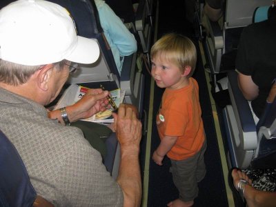 Charlie Chatting with somebody on the Plane.jpg