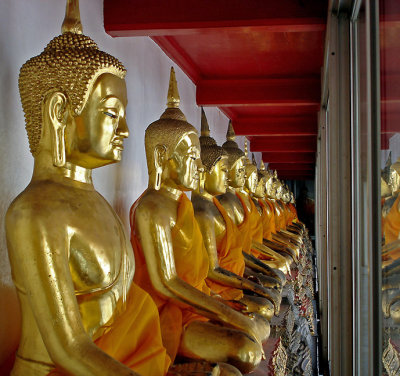 Row of Buddha images, close up