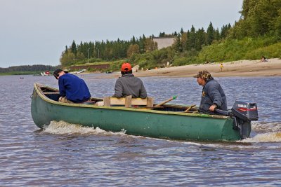 Boat in front of Moose Factory Island with Cree Village Ecolodge in background
