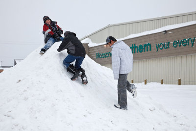 Boys on snow mound 2010 January 15th