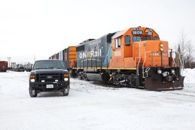 GP38-2 1806 beside hirail vehicle in Moosonee 2010 February 9