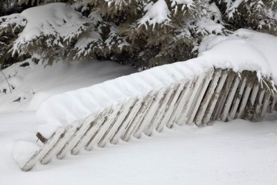 Snow covered fence at former museum