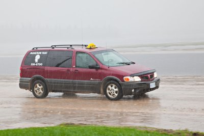 Taxi in the rain, Moose River in the background 2010 May 25th
