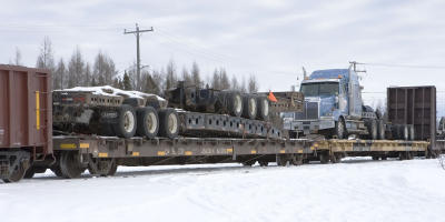 Truck and trailers on mixed train