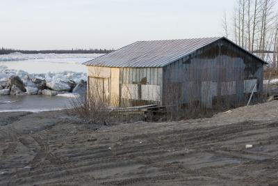 Storage shed along river