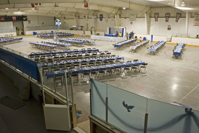 Decorating the arena pad for a wedding dinner and dance