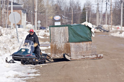 Snowmobile taxi on Ferguson Road South in Moosonee