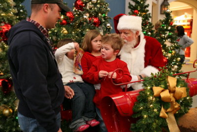 Mom tells us not to talk to strangers, and then Dad sets us on a stranger's lap!