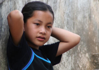 Lao girl on the banks of the Mekong