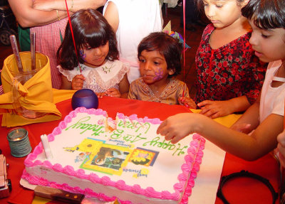 It sure is fun swiping from a cake before it is cut!:-)