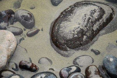 Partially Submerged Pebbles