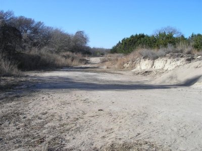 Sand  next to river