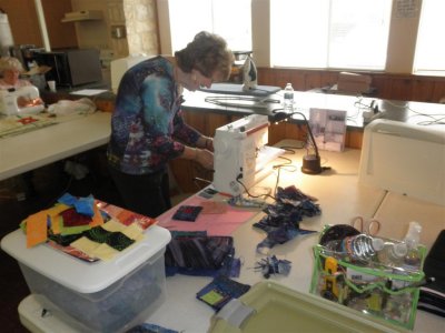 Many quilters work on each of their own projects