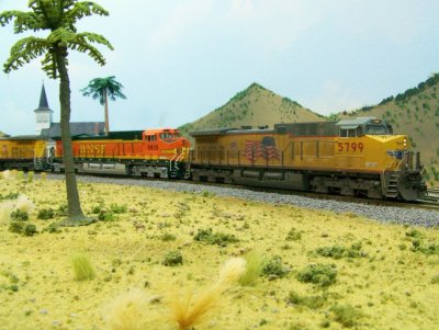 Weathered Kato #5799 and BNSF unit follows