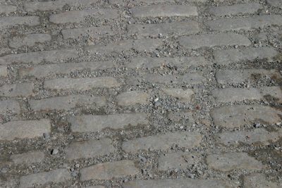 cobblestone street beneath pavement that ran between the Strand and the Modern