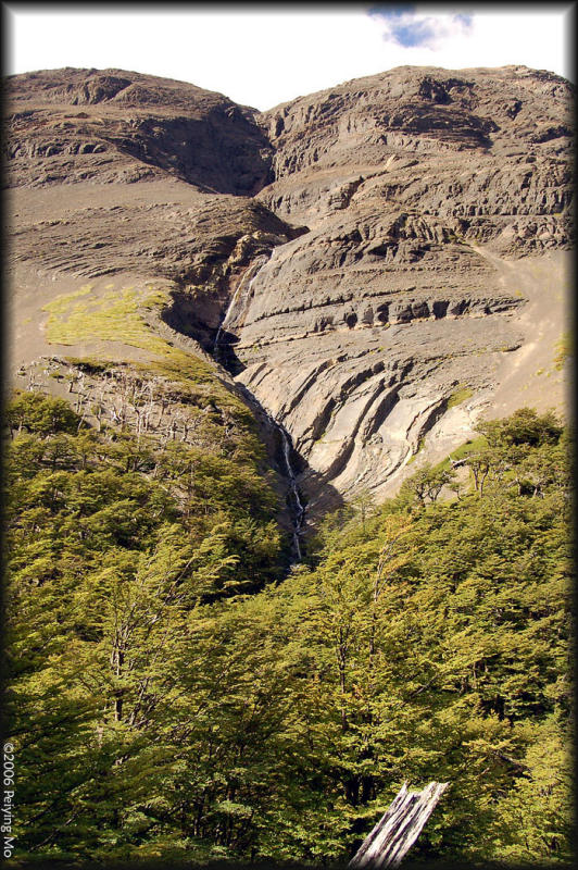 Narrow, long waterfalls lead to fresh clear water streams which we use for drinking