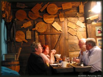 People leave their comments of the restaurant on wood boards