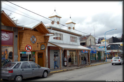 Tin roof and wood framed low rise buildings are typical