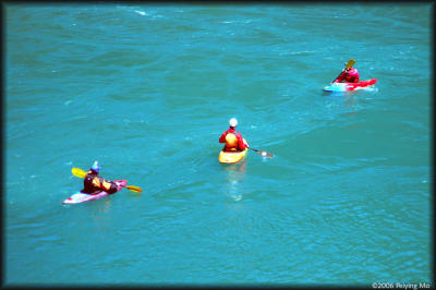 Sam (left), Norwood and Jorge in kayaks