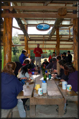 Piero gives his speech on the plan of the day at breakfast.