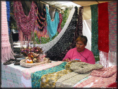 local outdoor market selling textiles
