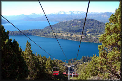 The chair lift to Cerro Campanario with the lake and Peninsula San Pedro in the background