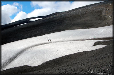 The snow patch is much bigger than it appears initially.