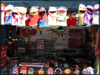 Street vendor  stand framed with muppets