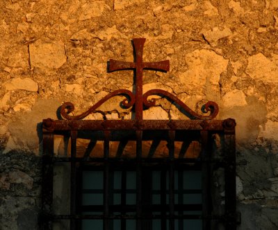 Old window at sunset light