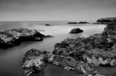 rocks and moving surf BW.jpg