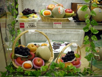 The fruit is gorgeous, but expensive.  Thats about $43US for that large basket of fruit, $14US for the small one top left.