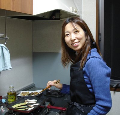 Kayun cooking up hubby's dinner