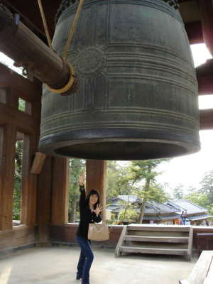 Kieko demonstrates the size of the bell