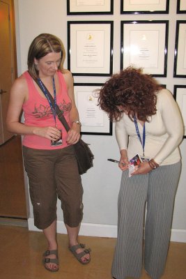 Gloria signs a CD insert for Lynsey
