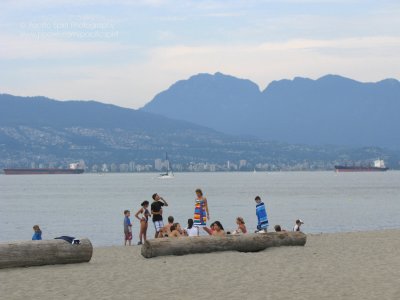A hot cloudy Sunday at Locarno Beach, Vancouver