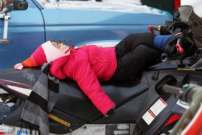 Sacked out Snowmobiler