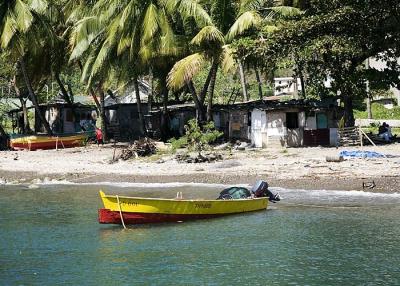 Colorful boat...tin shacks