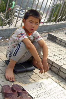 Child beggar, Zhongshan, China