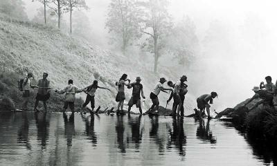 Water crossing to the hotspring at Gunung Rinjani, Lombok Indonesia