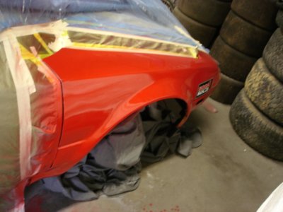 First coat of (re)paint down, Viper Red.  Now two layers of Chevy Victory Red followed by a clear coat.