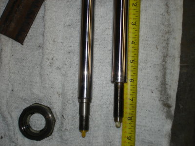 Close up of race shaft, can see that maximum shock travel is 5.5 (very faint) losing 3 of travel would be bad.