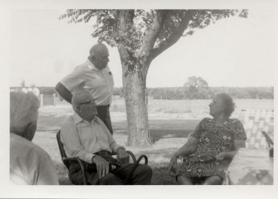 Earling seated glasses with _____, OK or TX