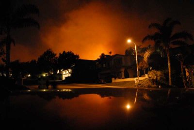 View from our front yard as fire approaches houses up the street