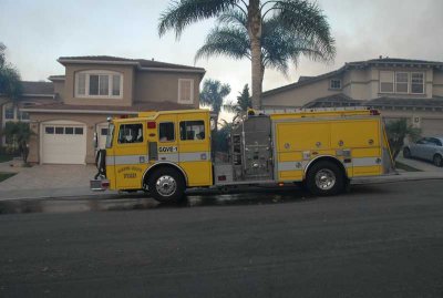 Tuesday 7:00AM fire behind houses up the block