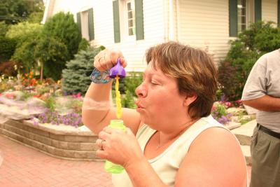 Melinda blowing bubbles 2004